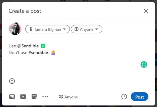 A screenshot of LinkedIn's Profile Create a post box showing the right way to mention a user or page.