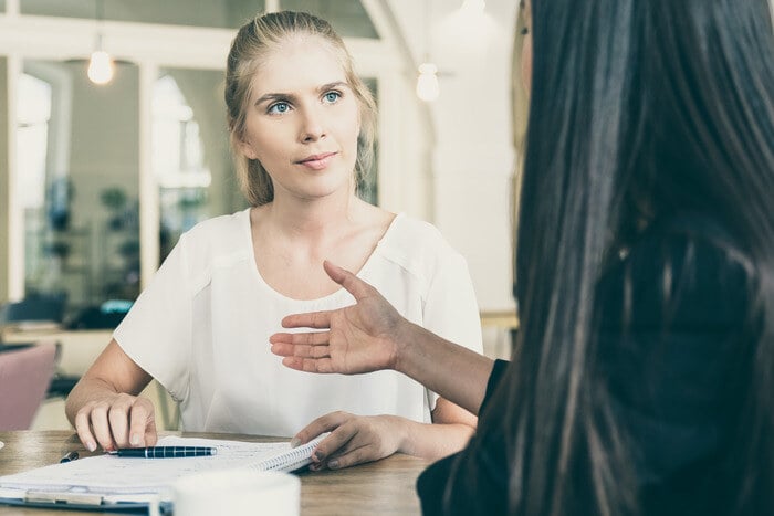 https://2235233.fs1.hubspotusercontent-na1.net/hubfs/2235233/blog-import/2022/11-22-Nov/16%20Marketing%20Interview%20Questions%20to%20Hire%20the%20Best%20Cultural%20Fit%20for%20Your%20Agency%20signing%20hiring%20agreement.jpg