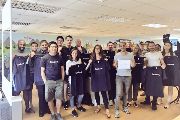 Sendible team at the office in 2017 with Facebook shirts